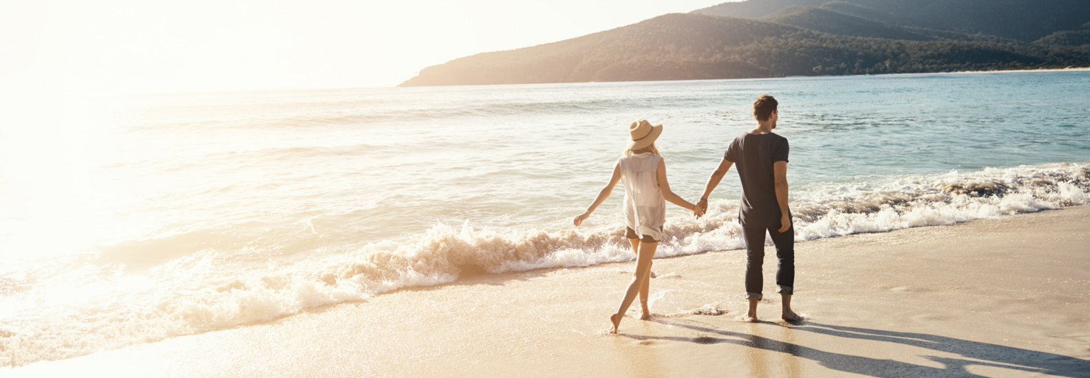 Couple walking on the beach