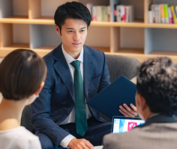Financial advisor talking to couple