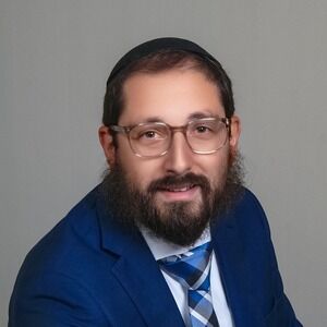 Headshot of Reuven Giter