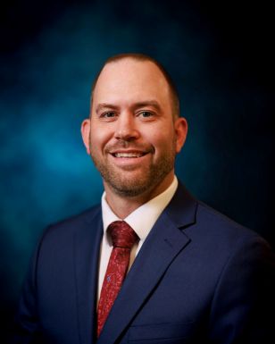Headshot of Aaron Dobbe