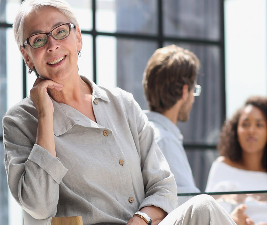 Women sitting smiling