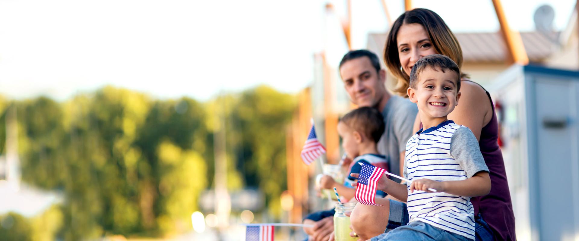 family with american flags