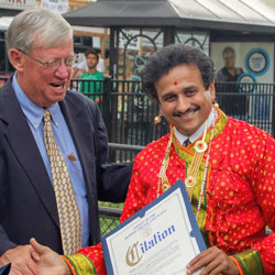 Jagdish Patel receiving an award