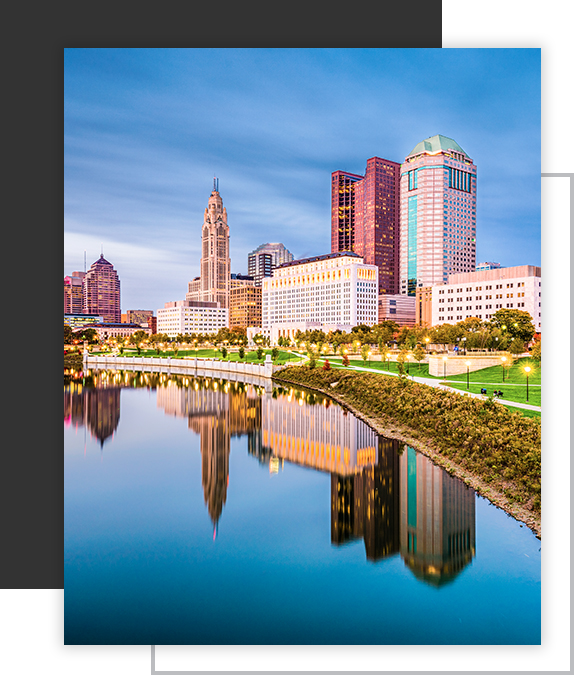 Columbus, Ohio, USA skyline on the river at dusk.