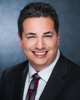 Armondo Brennan headshot