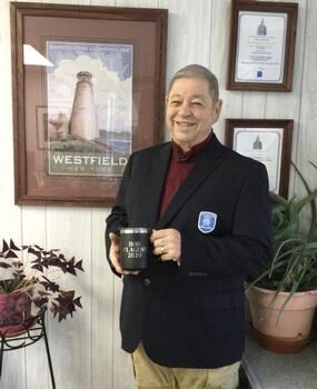 Robert Ducato posting with personalized mug