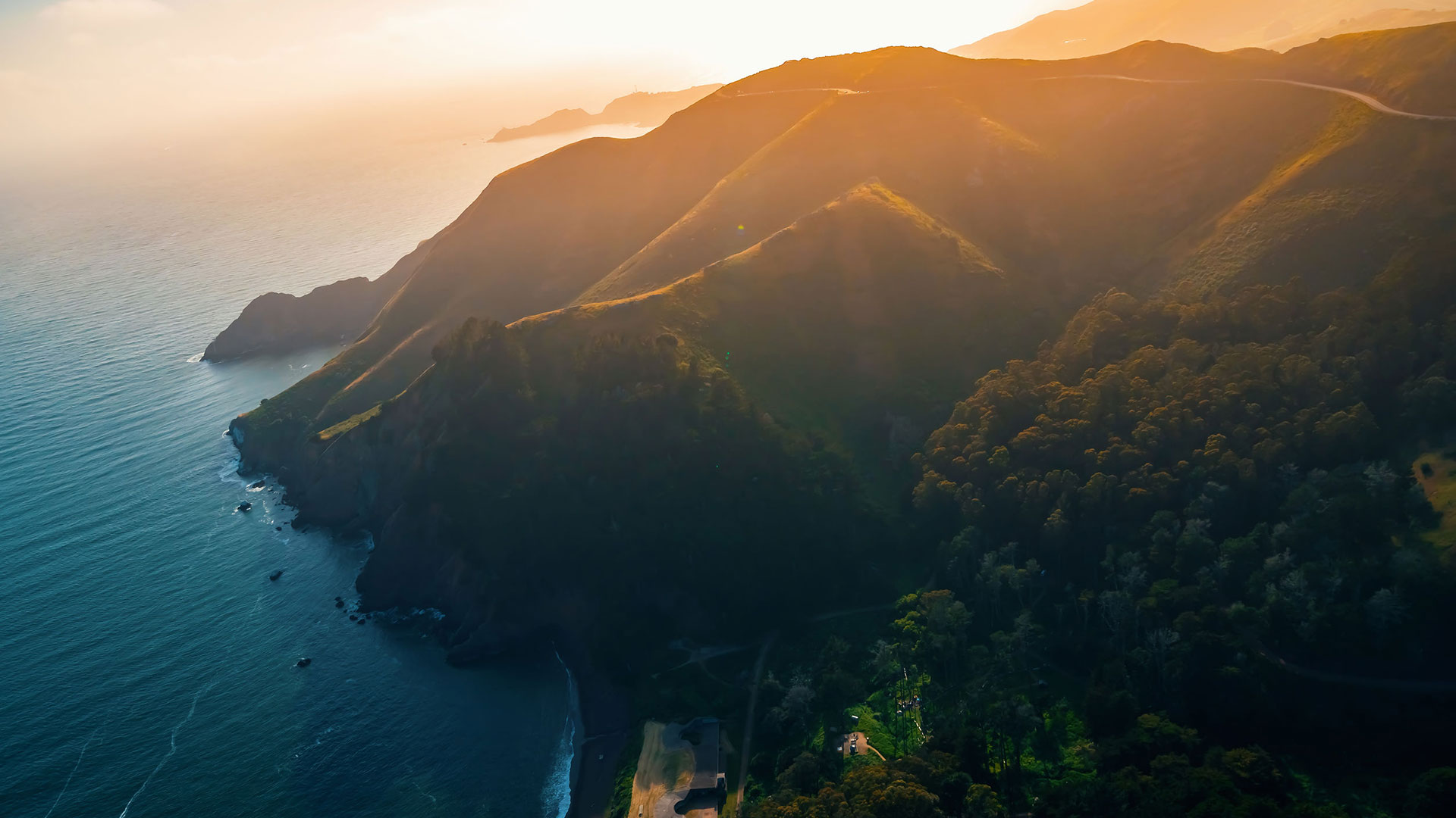 mountainous terrain shore ocean