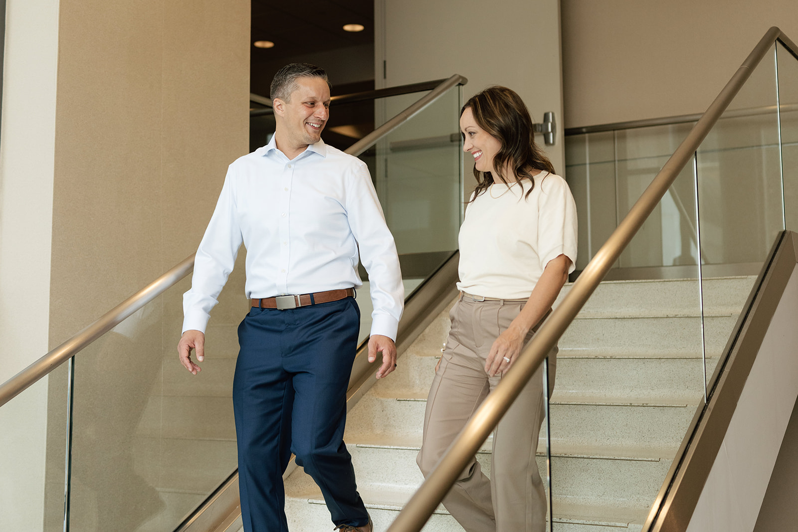 Nate & Megan Walking Down Stairs