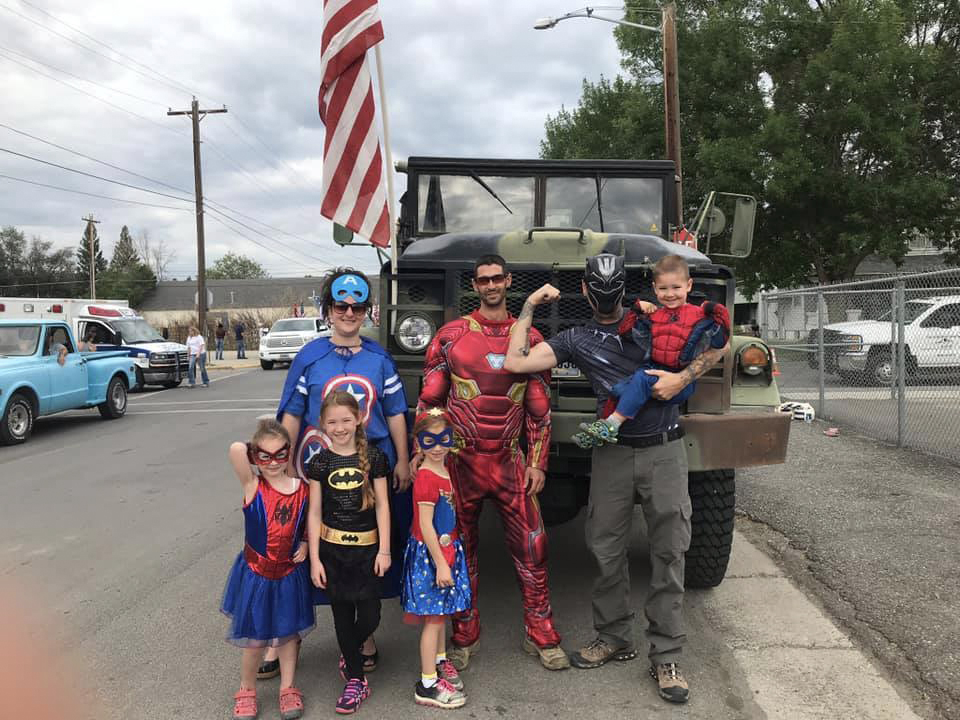 people dressed up in super hero costumes
