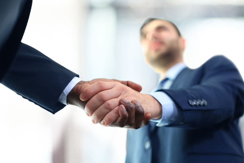 colleagues shaking hands