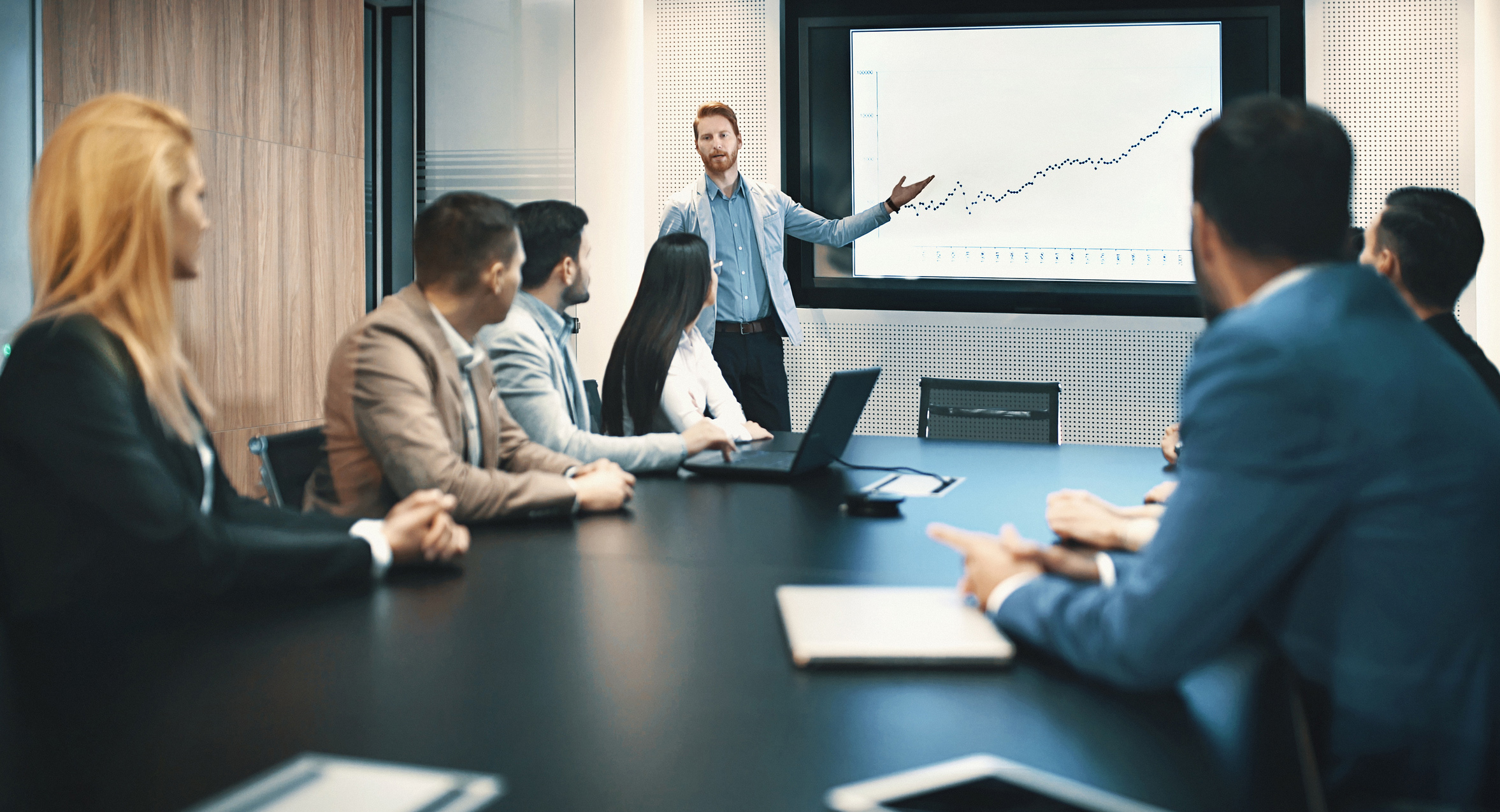 Conference Room Meeting With Presenter Image