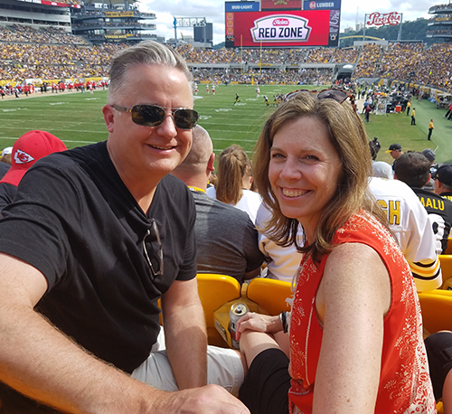 Steve at Chiefs Game With Wife Image