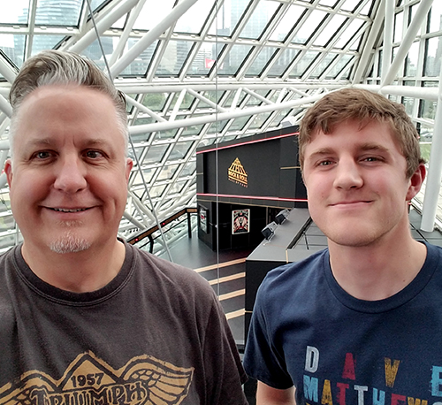 Steve Rock and Roll Hall of Fame With Son Image