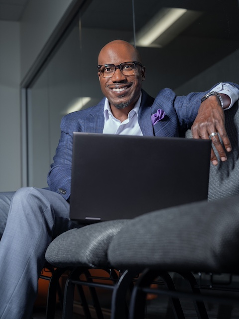 Al Johnson with laptop portrait