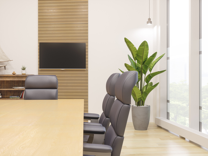empty conference room table and chairs