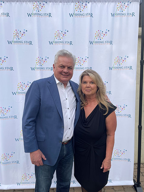 Image of John and a woman at the Wishing Star Foundation