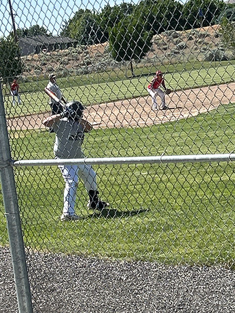 One of Keri's sons playing baseball