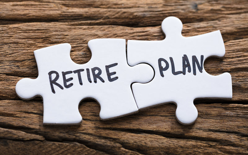 2 white puzzle pieces with text Retire Plan