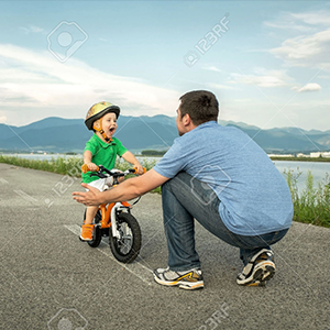 man with toddler riding bike
