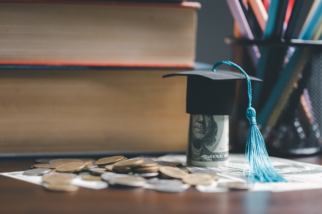 money with grad cap