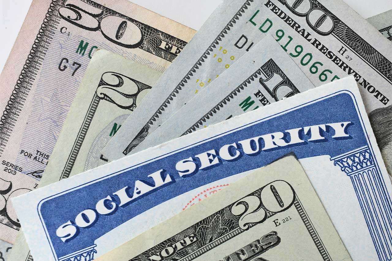 social-security-card-with-cash-money-dollar-bills