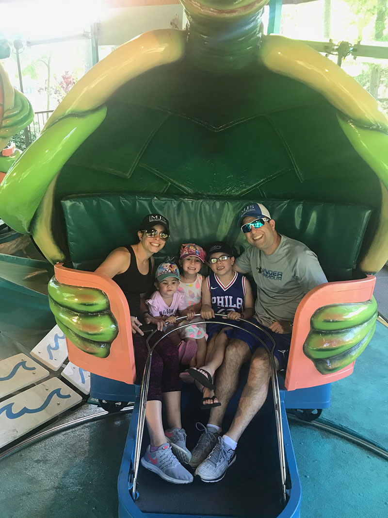 Marc's family in amusement park ride