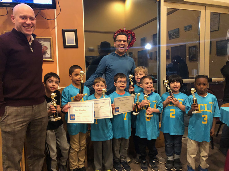 Marc with children sports team