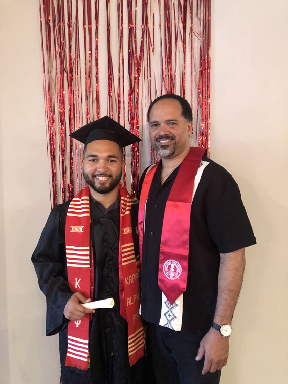 Mark Howard and a graduate