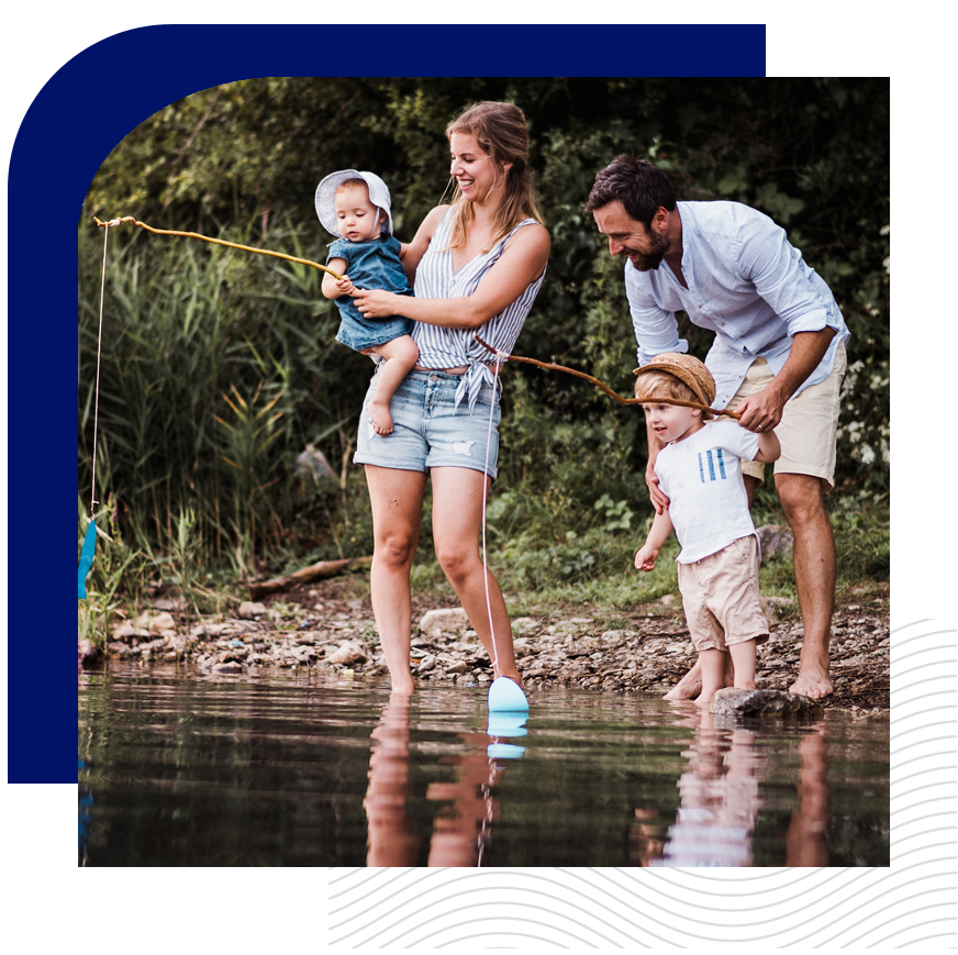 A layered graphic featuring a happy family fishing by a lakeside, with the parents supporting their two young children in a joyful outdoor moment.