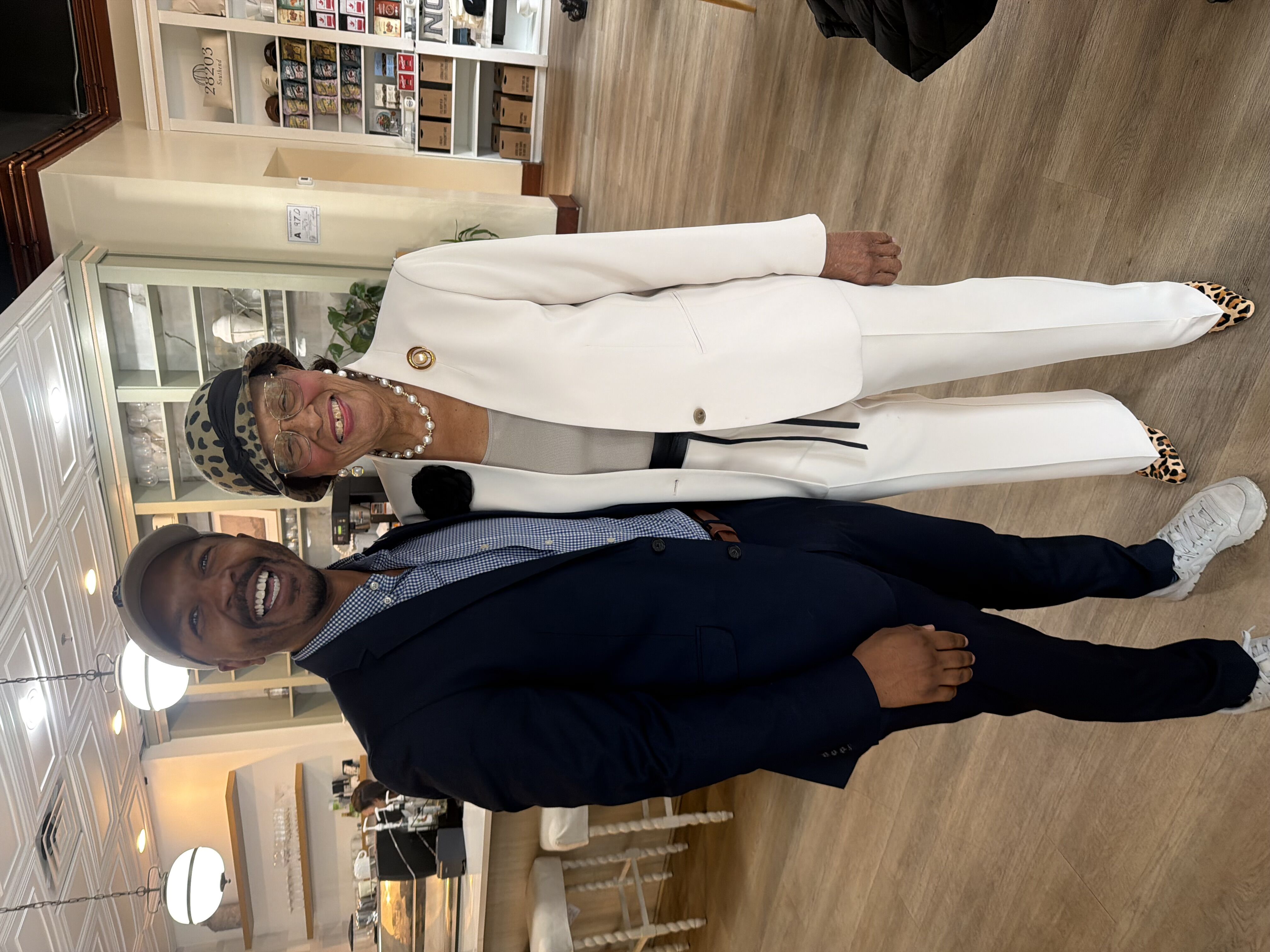 Lorenzo McNulty Financial Professional at New York Life Insurance Company standing with Congresswoman Alma Adams at Lotties Cafe in Charlotte, NC